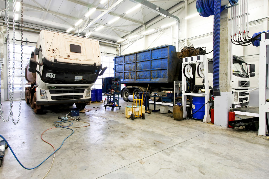 trucks on a maintenance bay
