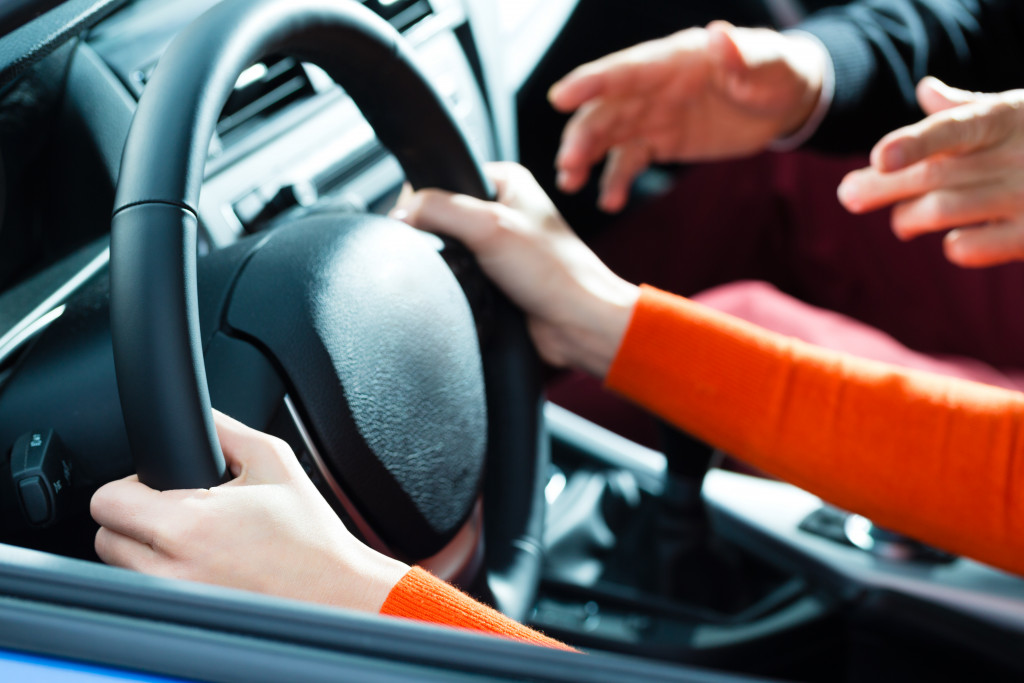 woman holding the wheel