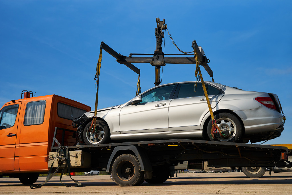 car lifted by a truck