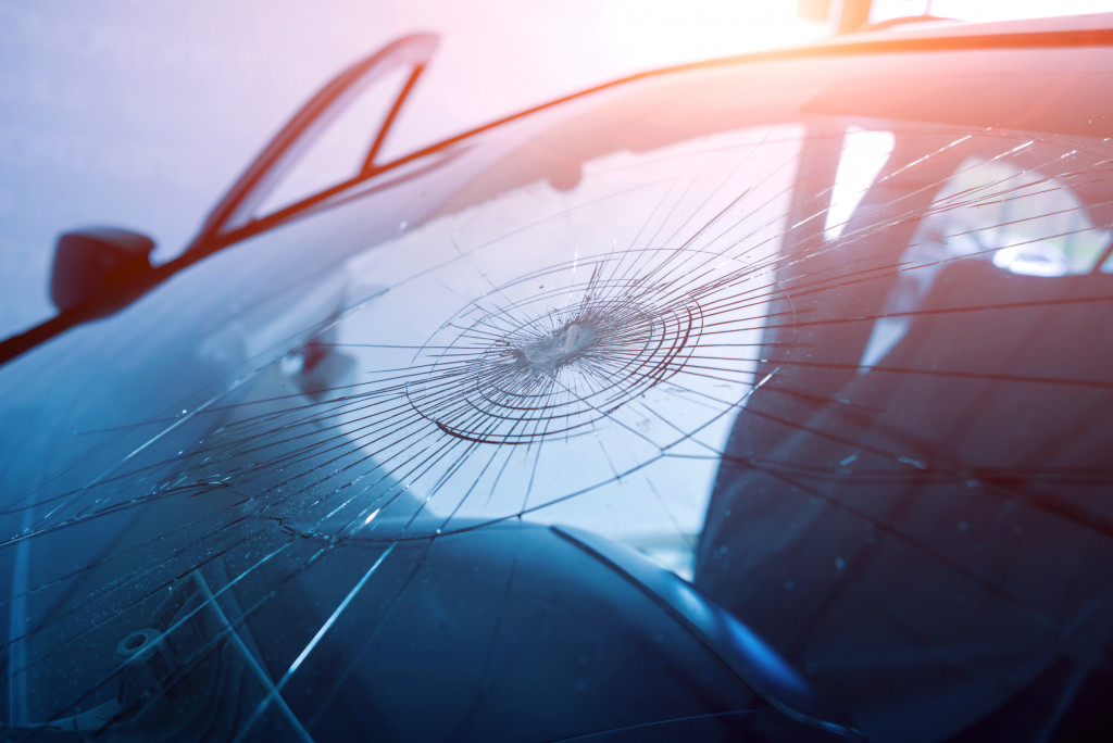 A car windshield with a radial crack