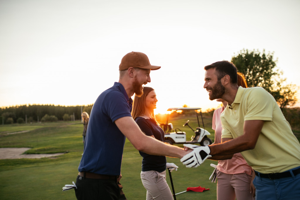 playing golf with friends