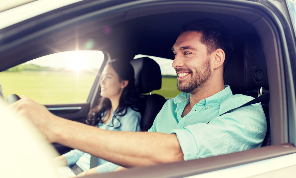 couple driving together in a car
