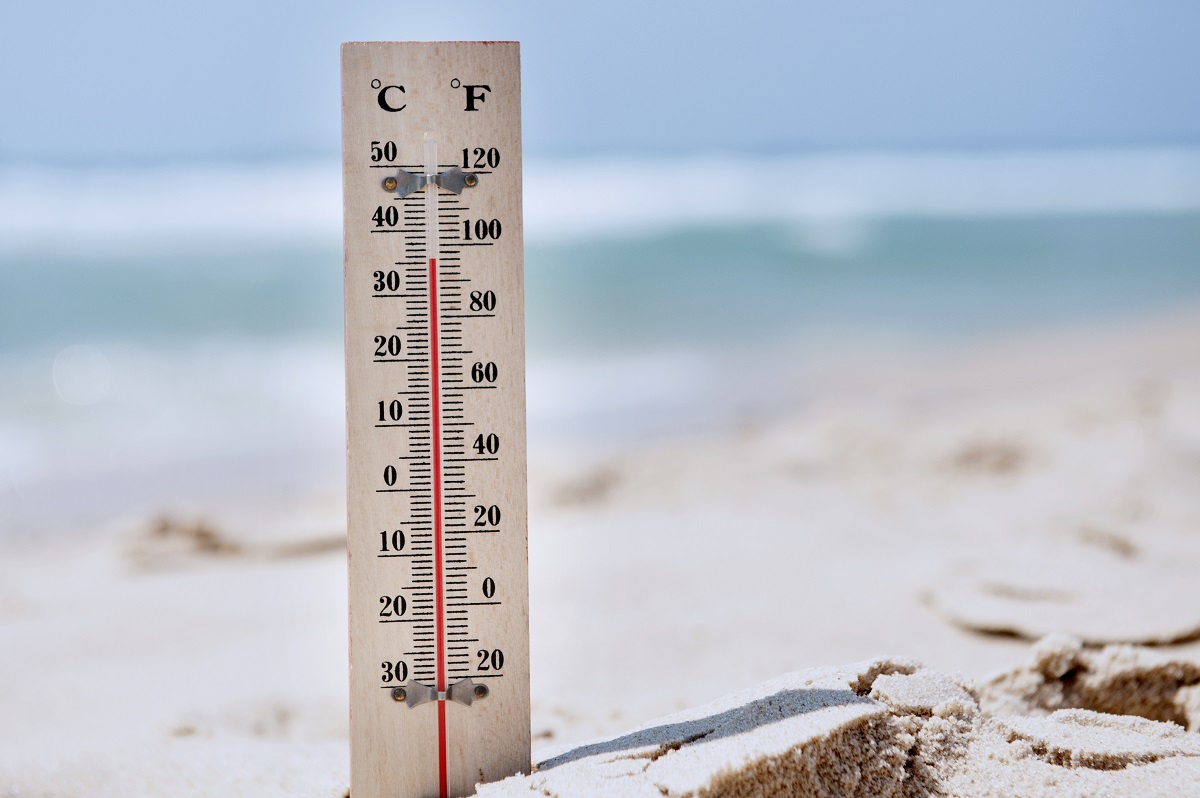 An image of a thermometer at a beach
